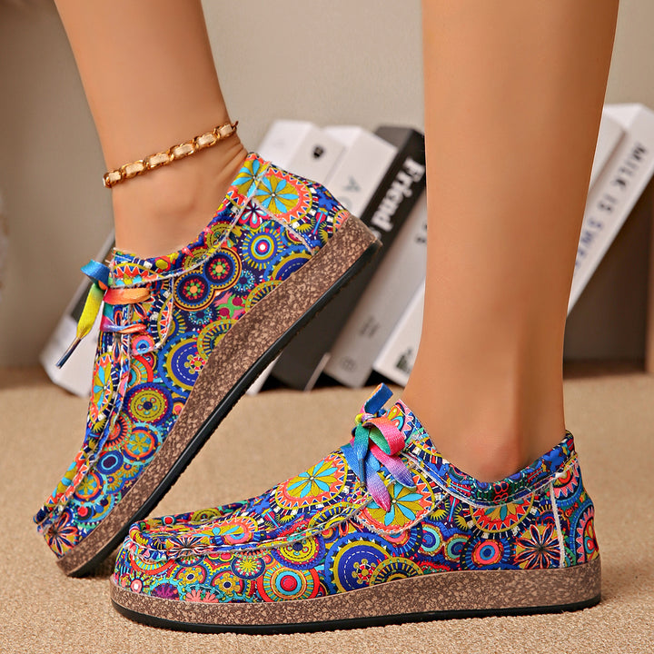 Damen Bequeme Plateau-Slipper im Ethno‑Print mit Korkoptik‑Sohle Echo Archiv