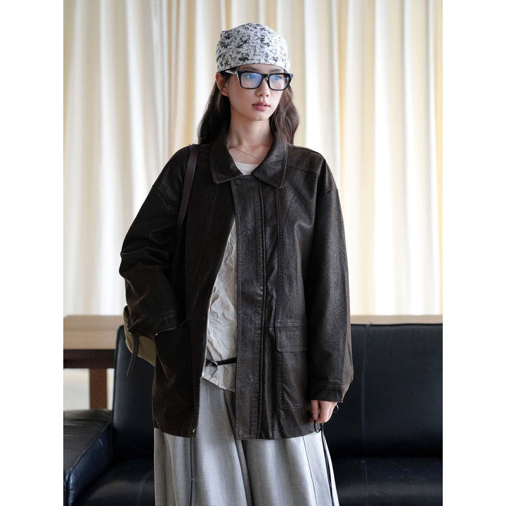 Damen Oversize Lederimitat-Mantel mit Reißverschluss und aufgesetzten Taschen Echoarchiv