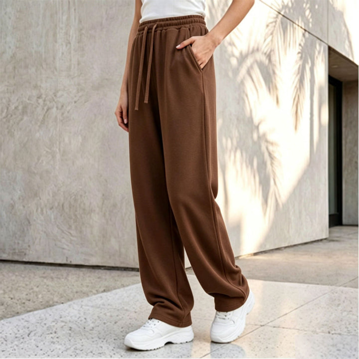 Damen nan weite Loungepalazzo-Hose mit hohem Komfortbund, Kordelzug, seitlichen Eingrifftaschen und dekorativer Seitennaht Echo Archiv