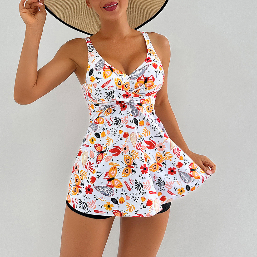 Damen Strandkleid mit floralem Wickeldesign und raffinierten Rüschendetails Echo Archiv