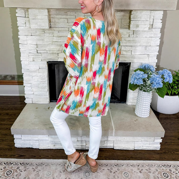 Damen Oversized V‑Neck Tunika im Plissee‑Look mit abstraktem Ikat‑Print – Avérine