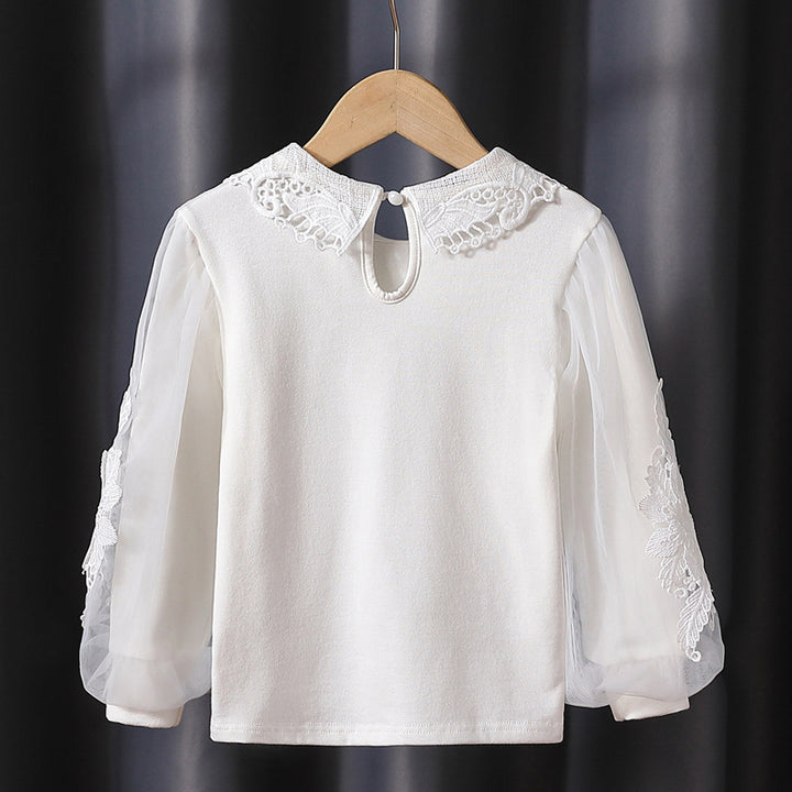 Mädchen modische Bluse mit eleganten Tüllärmeln und kunstvoller Spitzenverzierung Echo Archiv