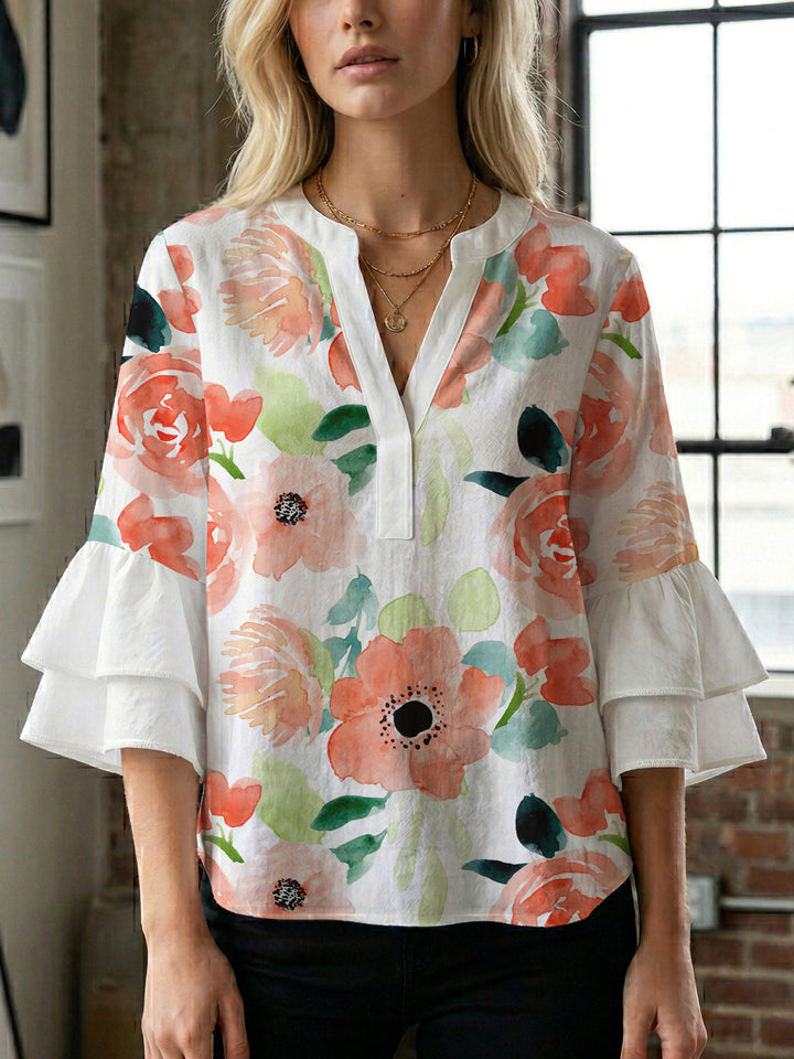 Damen Elegantes Oberteil mit voluminösen Rüchenärmeln und floralem Druck Echo Archiv