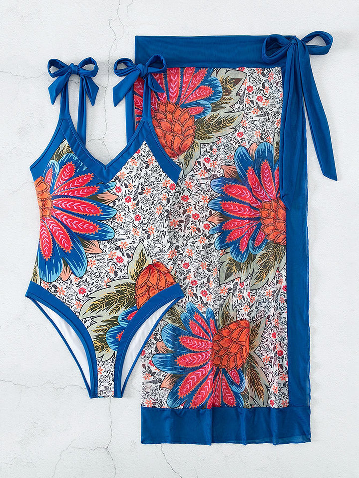 Damen Einteiliger Badeanzug mit floralem Design und passendem Wickelrock Echo Archiv