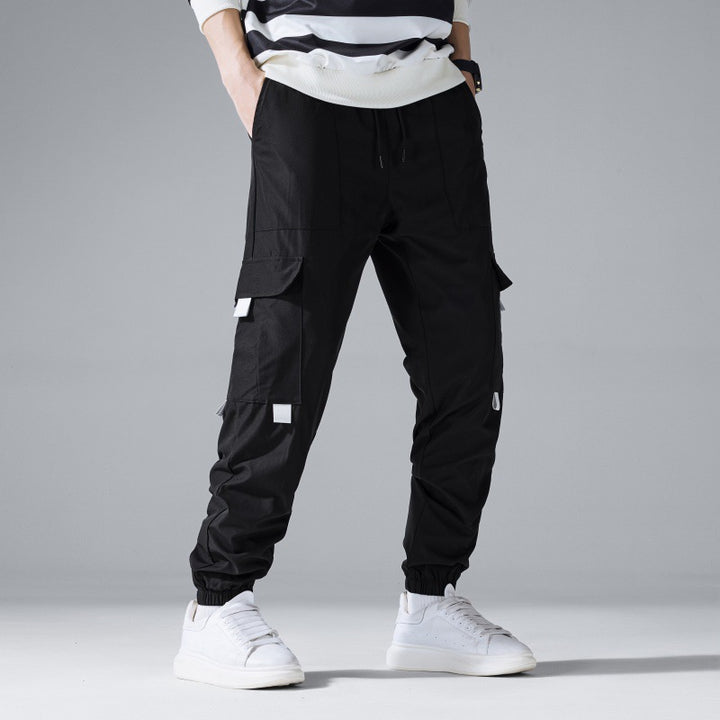 Herren Multifunktionale Cargo-Jogginghose mit Klapp‑ und Gurt-Details Echo Archiv
