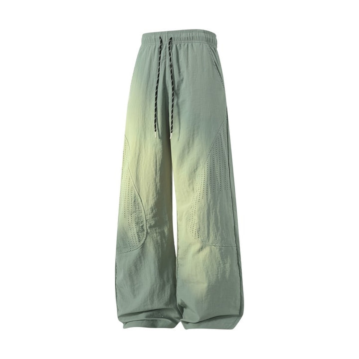 Damen Weite Baggy-Leinenoptik-Hose mit Tunnelzug, perforierten Einsätzen & Relaxed-Silhouette Echoarchiv