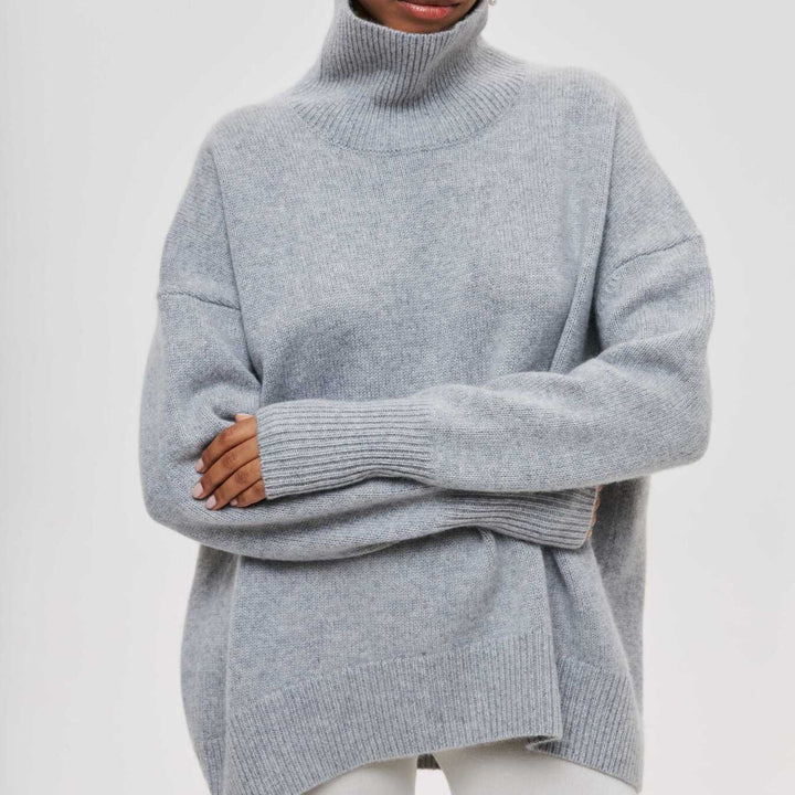 Damen Kuscheliger Oversize Rollkragenpullover mit verdeckten Seitenschlitzen und extra langem Rippbund – Mavelle
