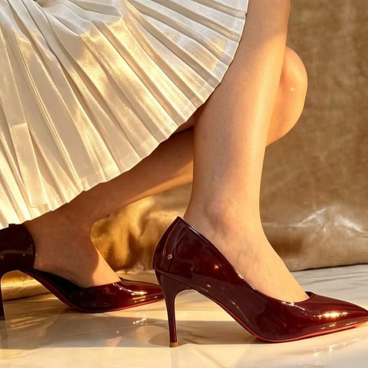 Damen Spitz zulaufende High-Heels in Lackoptik mit schmalem Stiletto und kontrastierender Glanzsohle Echo Archiv