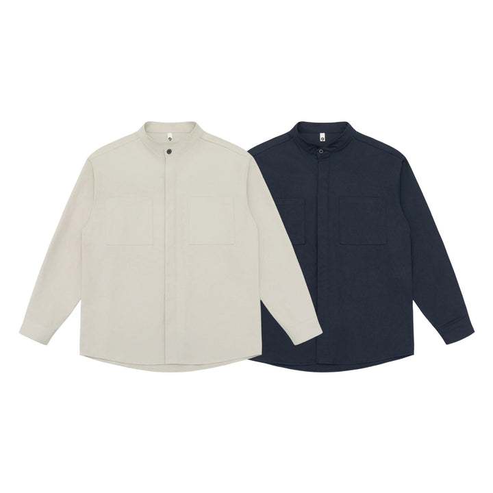 Unisex Hemdjacke mit Stehkragen, verdeckter Knopfleiste und aufgesetzten Brusttaschen Echoarchiv