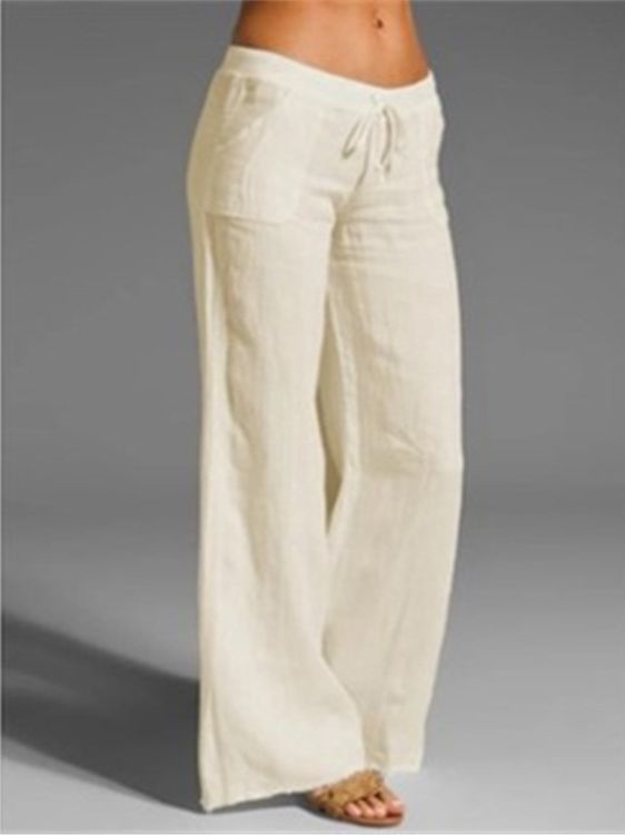 Damen weite Leinenhose mit hochgezogenem Bund und seitlichen Taschen Echoarchiv