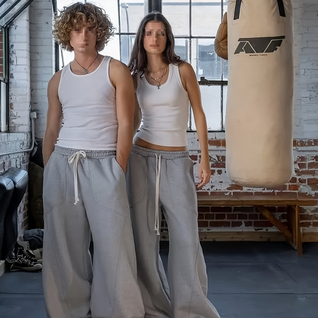 Damen Weite High‑Waist Baggy‑Jogginghose mit Tunnelzug, elastischem Bund und aufgesetzten Taschen Echoarchiv