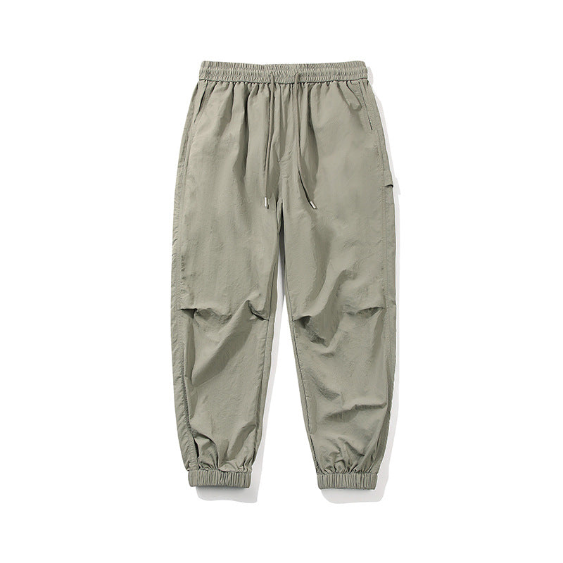 Herren Nylon-Mix Relaxed-Jogger mit elastischem Komfortbund, verdeckten Reißverschlusstaschen und geripptem Knöchelabschluss Echo Archiv