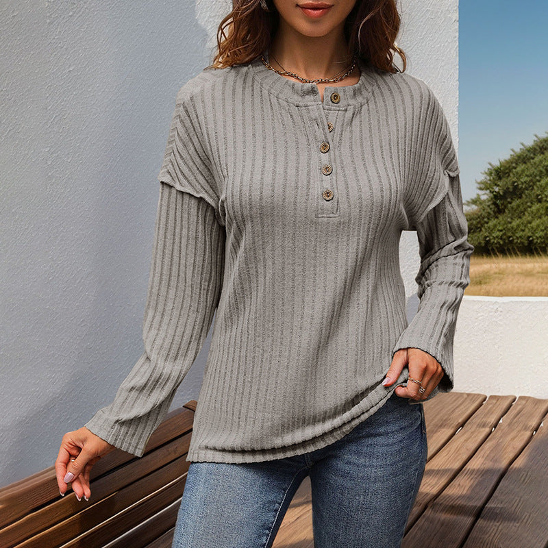 Damen Gerippter Henley-Pullover mit Knopfleiste und überschnittener Schulter Echoarchiv