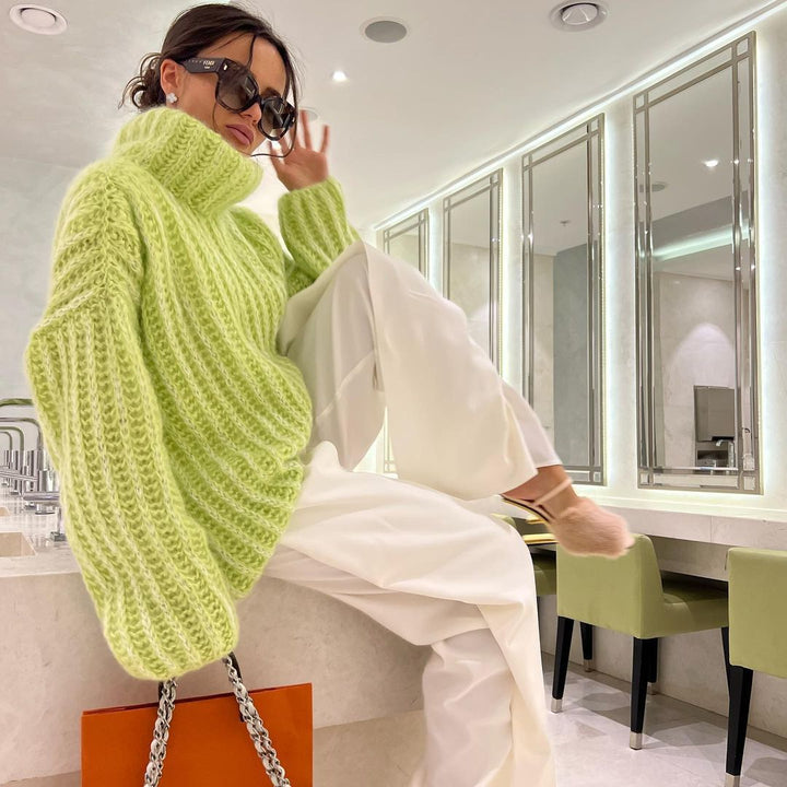 Damen Oversized Grobstrick-Rollkragenpullover mit voluminösen Ärmeln Echoarchiv