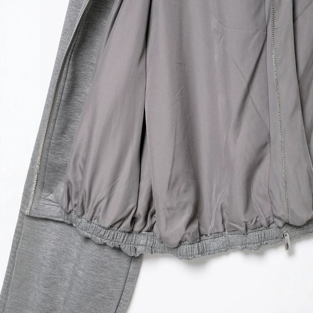 Damen Cropped Kapuzen-Sweatjacke mit Ballonärmeln und Tunnelzug Echoarchiv