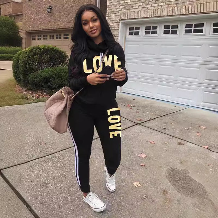 Damen nan sportives Kapuzen-Sweatshirt-Set mit Goldprint und Highwaist-Jogginghose Echo Archiv