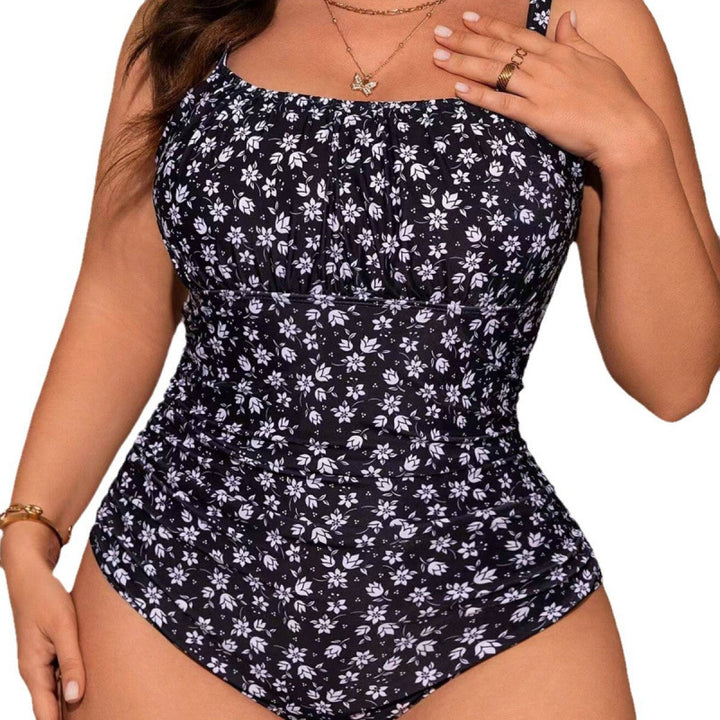 Damen Einteiler Badeanzug mit floralem Schnitt und elegantem Wickeldetail Echo Archiv