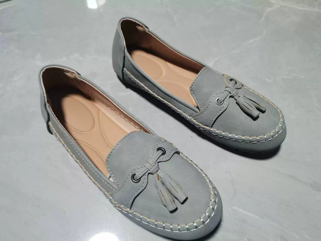 Damen  klassische Mokassin-Slipper mit Quasten, handgenähter Rahmennaht und rutschfester Gummisohle Echo Archiv