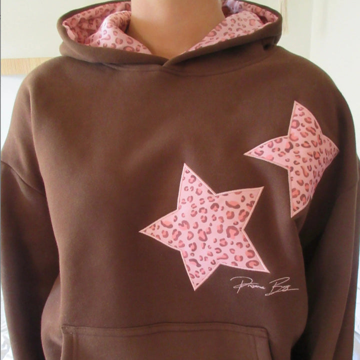 Damen nan Oversize-Kapuzenpullover mit Stern-Applikationen und gefütterter Kapuze Echo Archiv