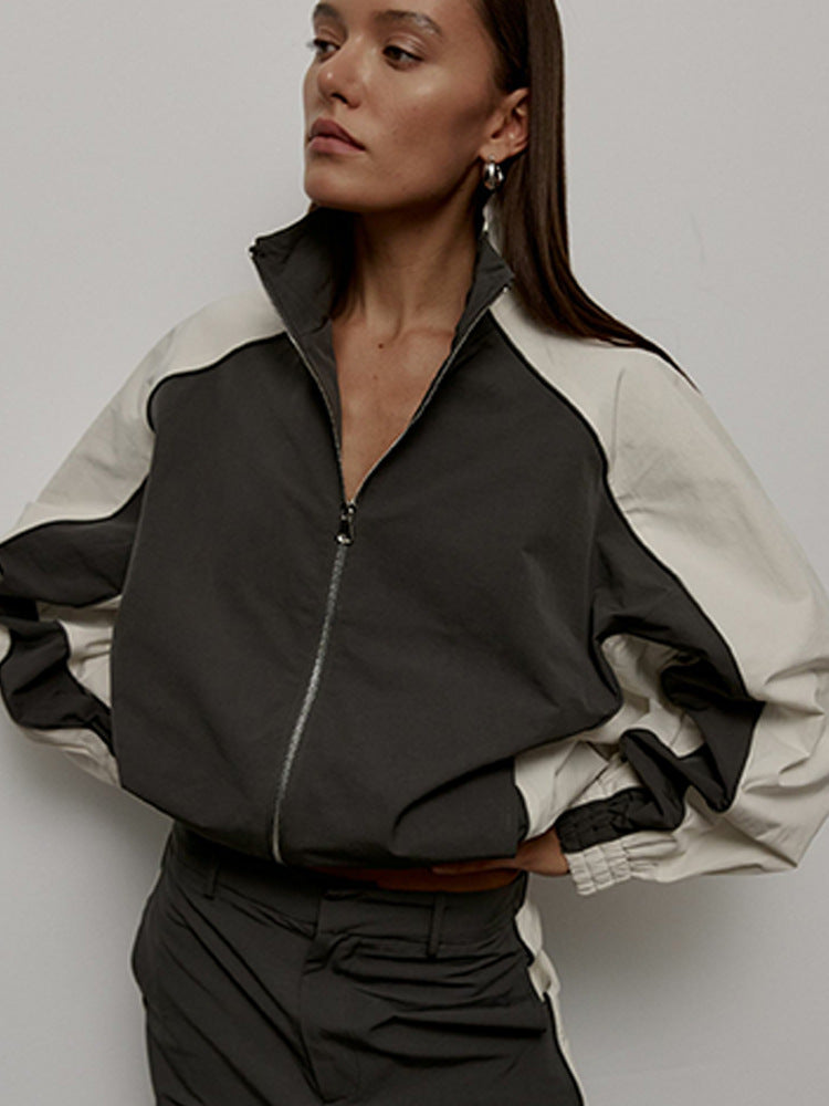 Damen nan sportive Oversize-Trackjacke mit hohem Stehkragen und Raglanärmeln Echo Archiv