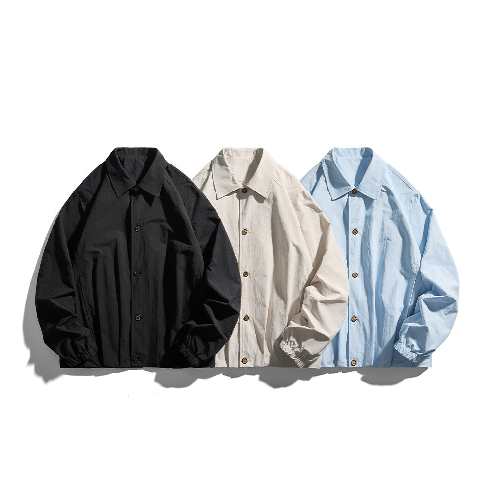Unisex Leichte Hemdjacke im Boxy-Schnitt mit Holzknopfleiste und elastischen Bündchen Echoarchiv