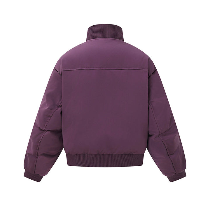 Damen Kurz geschnittene wattierte Blousonjacke im Boxy‑Schnitt mit hohem Rippenkragen und markanten Eingrifftaschen Echoarchiv