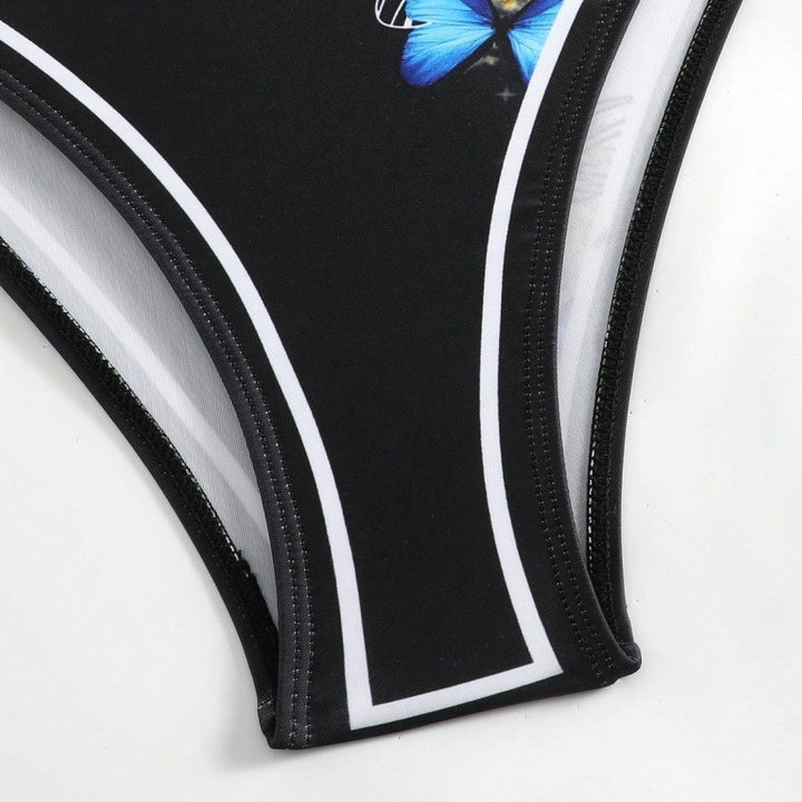 Damen Einteiler Badeanzug mit schickem Wickelrock und Butterfly-Motiv Echo Archiv