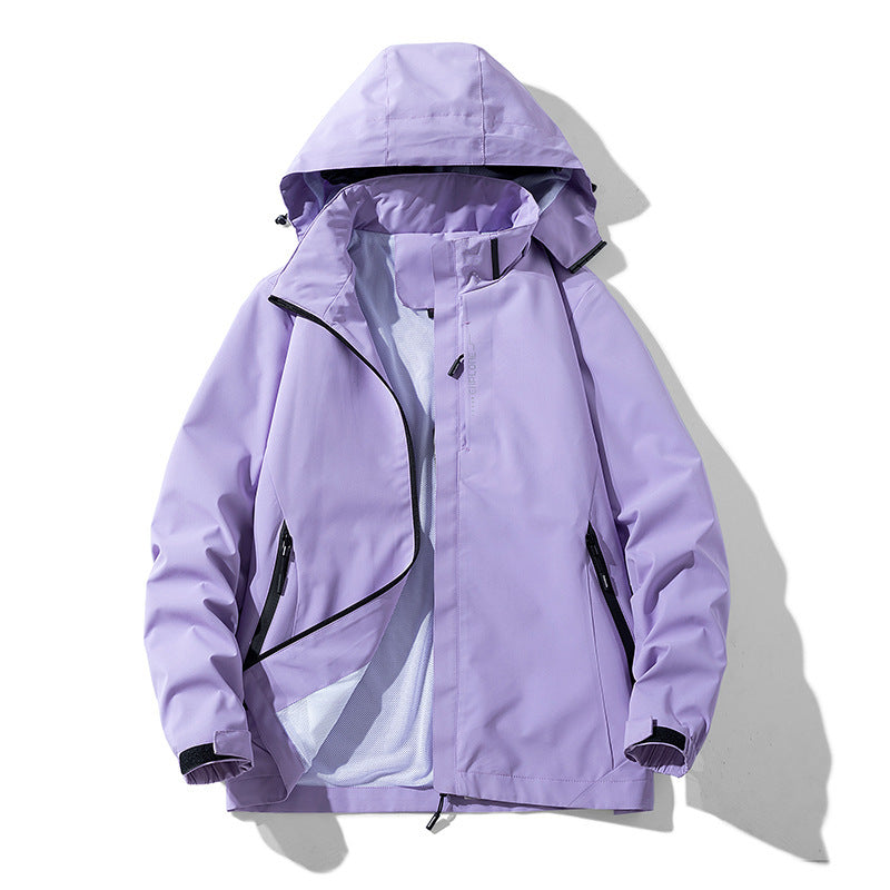 Damen wasserdichte Outdoorjacke mit atmungsaktivem Netzfutter, mit Reißverschluss versehenen Taschen und Klettverschlüssen – Célinea