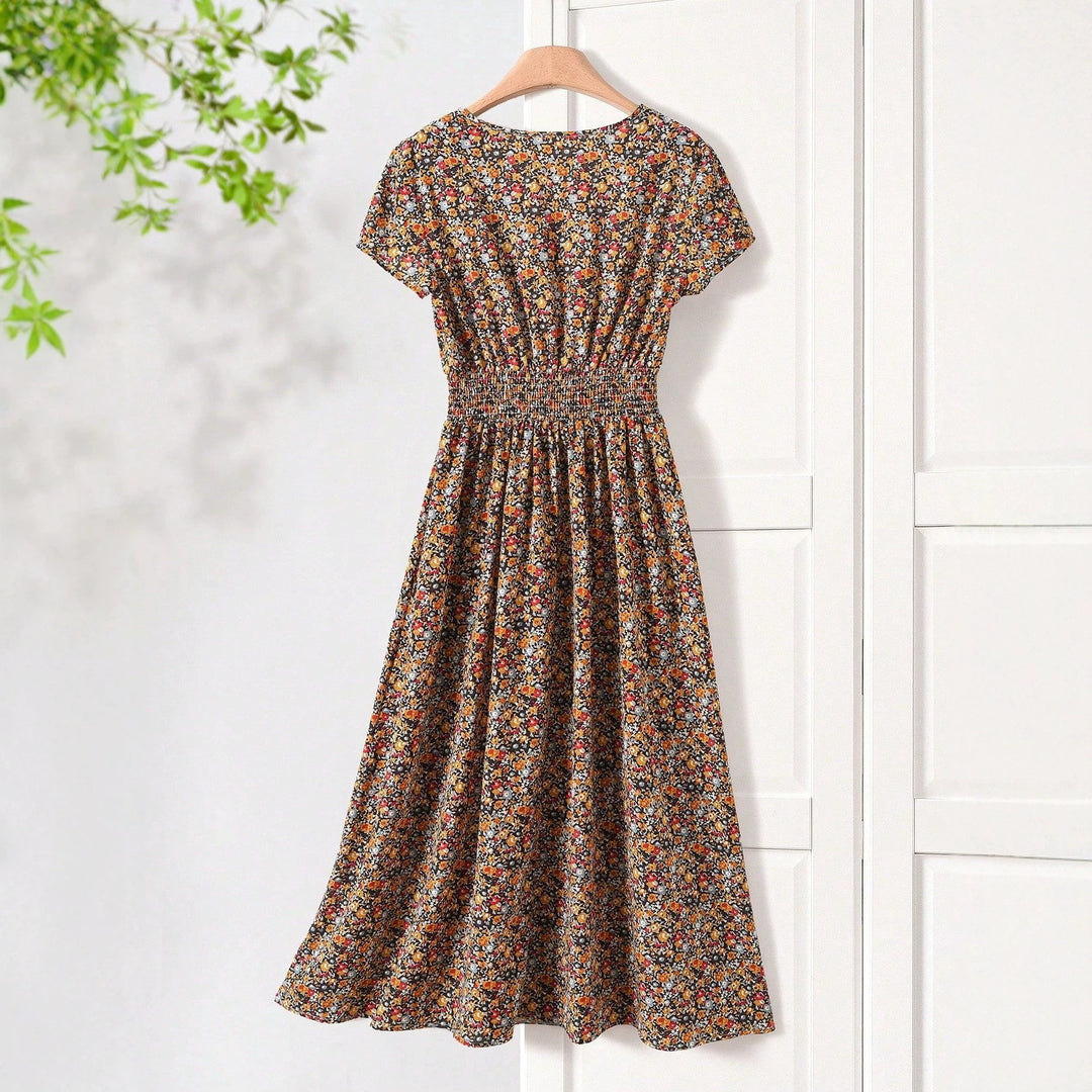 Damen Sommerliches Midikleid mit elastischem Bund und floralen Mustern Echo Archiv