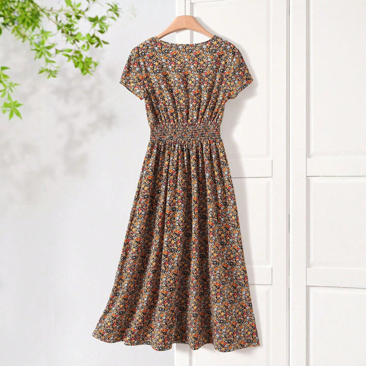 Damen Sommerliches Midikleid mit elastischem Bund und floralen Mustern Echo Archiv