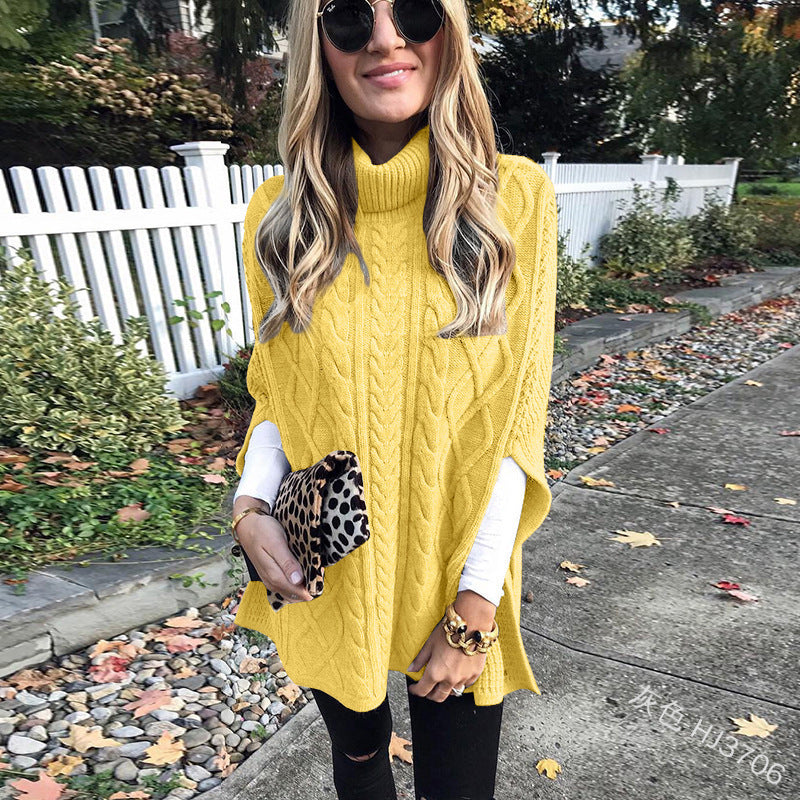 Damen nan kastiger Strickponcho mit hohem Rollkragen, Zopfstruktur und seitlichen Schlitzen Echo Archiv