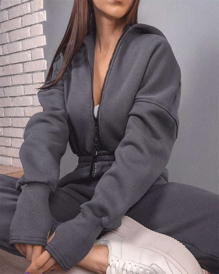 Damen Taillierter Kapuzen-Sweat-Jumpsuit mit Reißverschluss und elastischem Taillenbund – Solévia