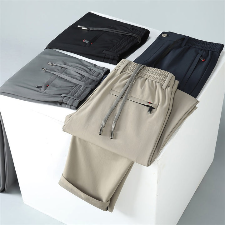 Herren bequeme Sporthose mit elastischem Bund und seitlichen Reißverschlusstaschen Echoarchiv