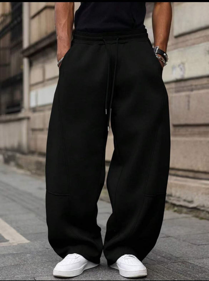 Herren weite Sweatpants im Baggy Cut mit elastischem Bund, Tunnelzug und Eingrifftaschen Echo Archiv
