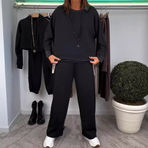Damen nan Oversize-Jogging-Set mit kastigem Sweatshirt und weiter Palazzo-Hose mit dekorativem Seitenband Echo Archiv