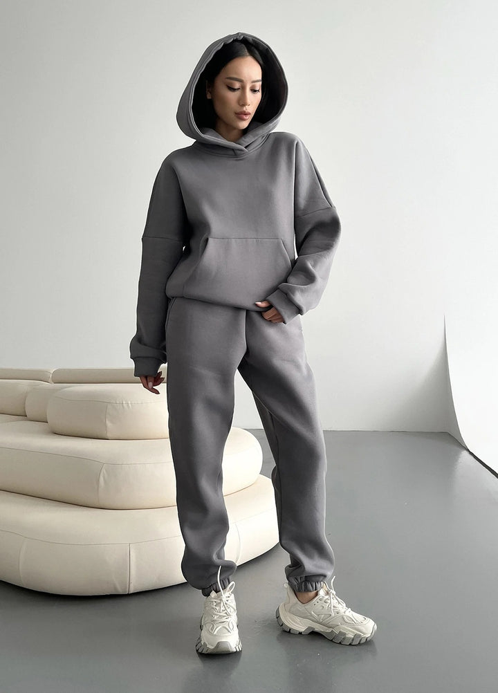 Damen nan zweiteiliges Komfort-Loungewear-Set mit oversized Kapuzenpullover, Kängurutasche und elastischem Knöchel-Jogger aus French Terry Echo Archiv