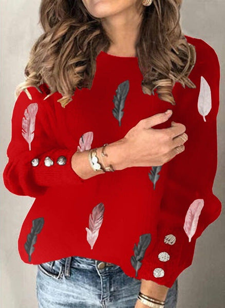 Damen Feinstrickpullover mit Federmotiv, Rundhalsausschnitt und dekorativer Knopfleiste Echoarchiv