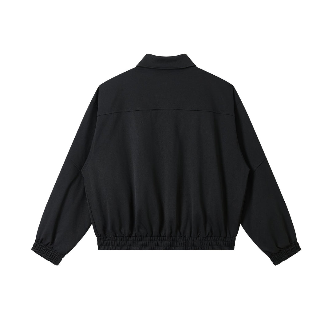 Unisex Kurz geschnittene technische Blousonjacke mit verdeckter Frontblende und elastischem Saum Echoarchiv