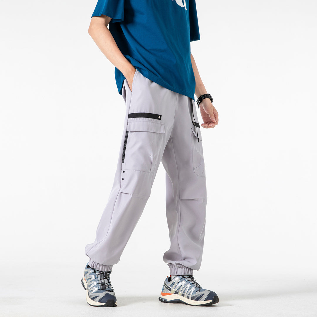 Herren weite Cargo-Jogginghose im Tech‑Utility‑Look mit elastischem Bund und multifunktionalen Klapptaschen Echo Archiv