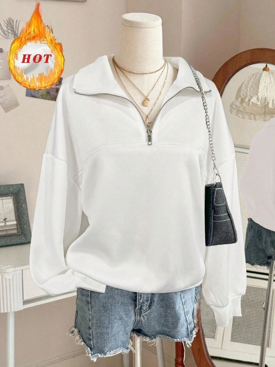 Damen nan Oversize Sweatshirt mit halbem Reißverschluss, Stehkragen und Ballonärmeln Echo Archiv