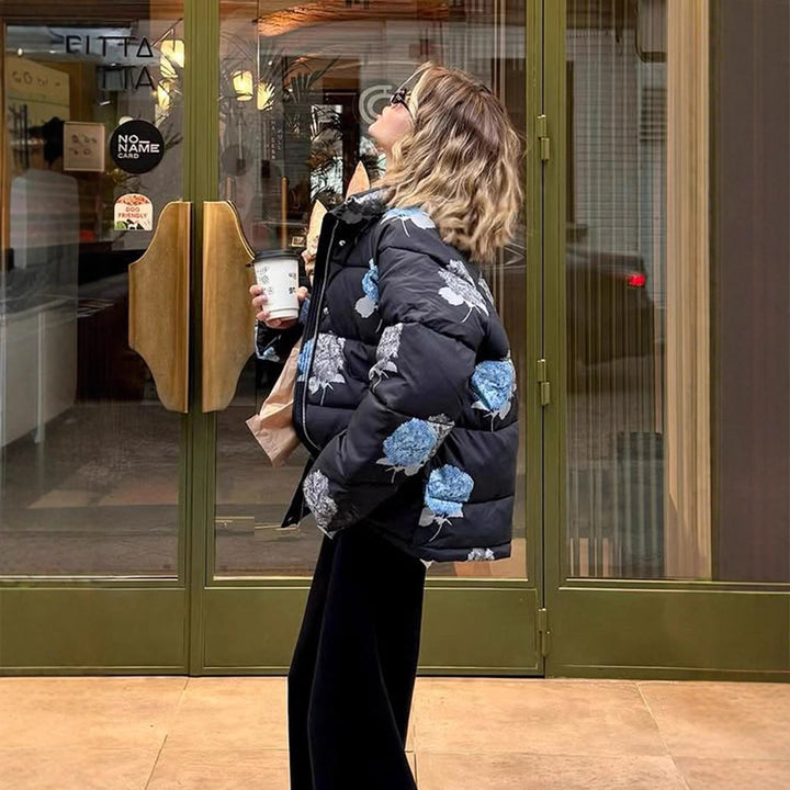 Damen Gepolsterte Oversize-Steppjacke mit Blumenprint und Kapuze Echoarchiv