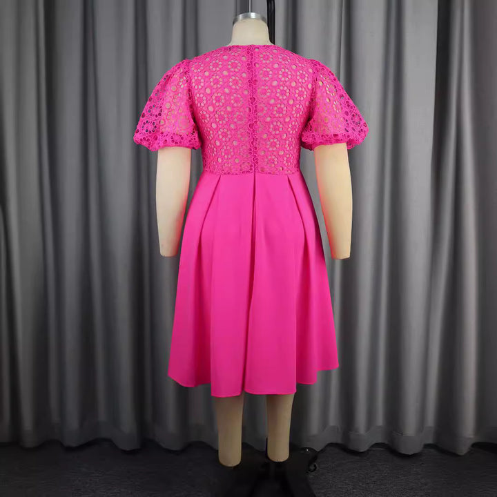 Damen Elegantes A-Linien Kleid mit Cut-Out-Details und Puffärmeln Echo Archiv