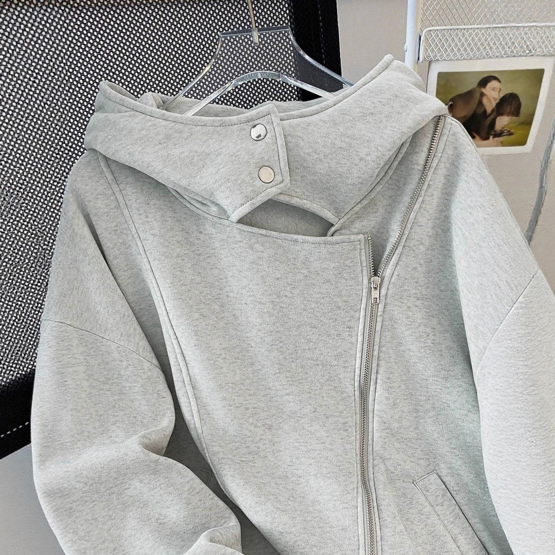 Damen Oversized Kapuzenjacke mit asymmetrischem Reißverschluss und Cut-Out-Detail – Avérine