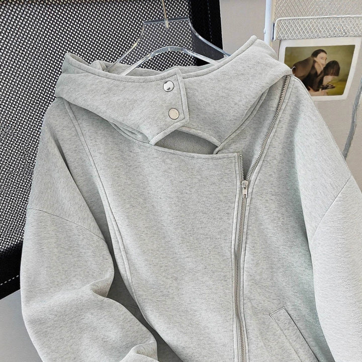 Damen Oversized Kapuzenjacke mit asymmetrischem Reißverschluss und Cut-Out-Detail – Avérine
