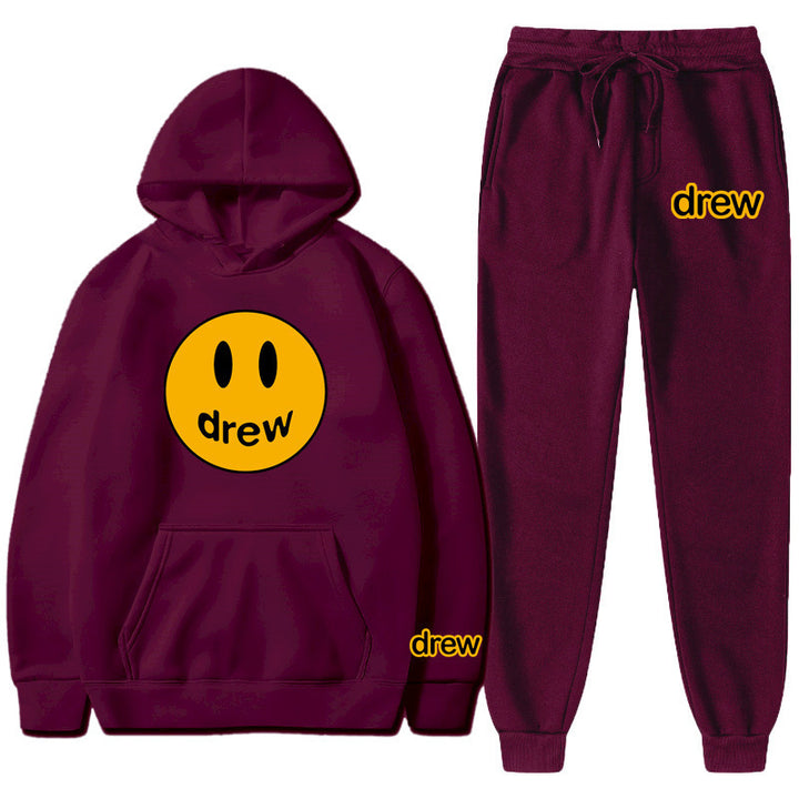 Unisex nan zweiteiliges Lounge-Set aus French-Terry mit Smiley-Print Kapuzenpullover und tapered Jogginghose Echo Archiv