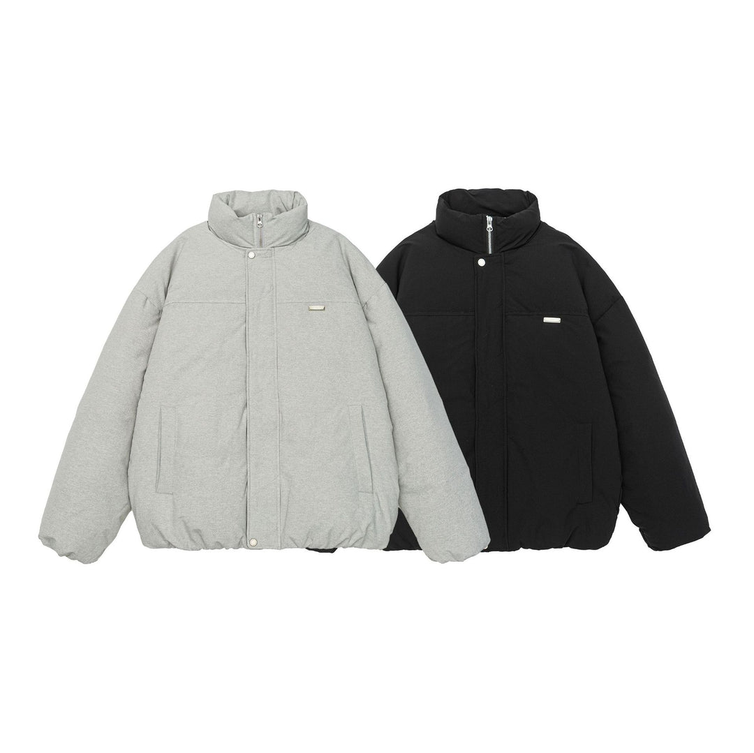 Damen Kurz geschnittene Oversize Steppjacke mit hohem Stehkragen und verdecktem Reißverschluss Echoarchiv