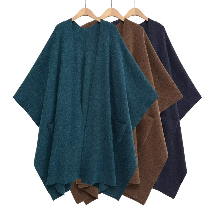 Damen Oversize Strickponcho mit Eingrifftaschen und asymmetrischem Saum Echo Archiv