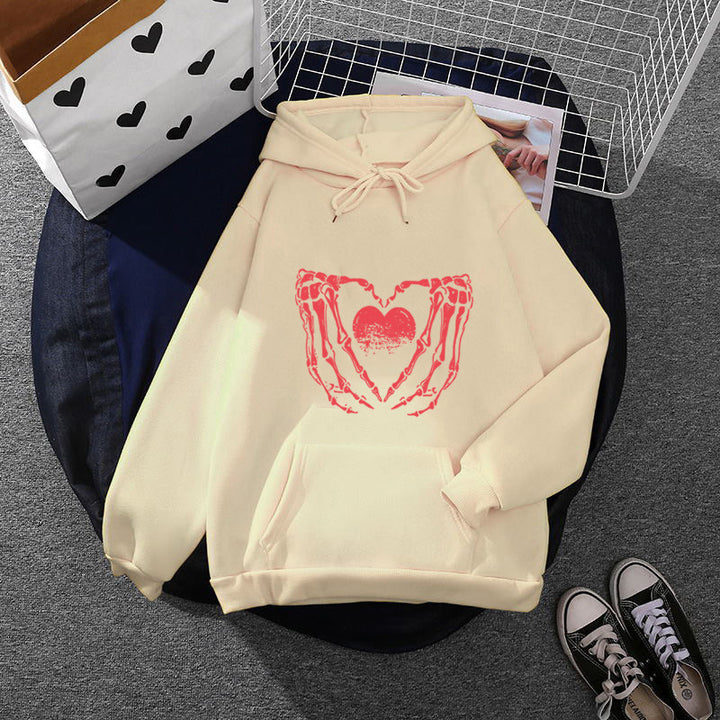 Damen stylischer Kapuzenpullover mit Skeletthand Herzmotiv und Kängurutasche – Auréline