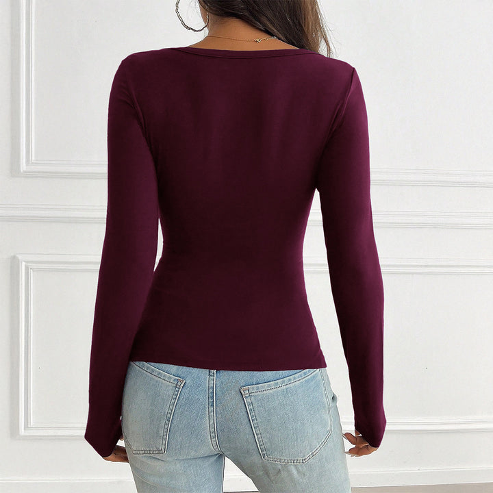 Damen tailliertes Langarmshirt mit geraffter Knopfleiste und tiefem V-Ausschnitt – Maréline