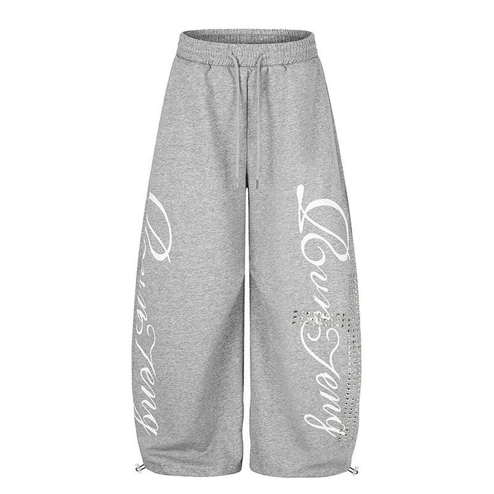 Damen Palazzo-Sweatpants im Culotte-Stil mit hohem Bund, Tunnelzug, Schriftprint und Strassbesatz Echoarchiv